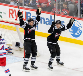 The New Jersey Devils celebrate a goal against the New York Rangers.